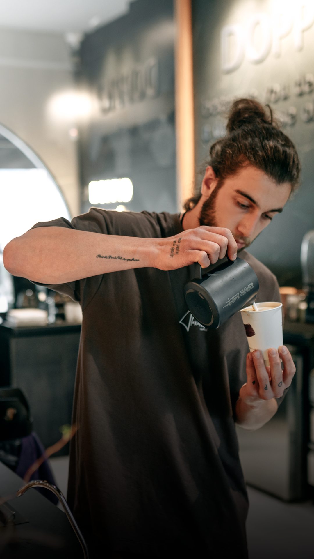 A Doppio barista at work